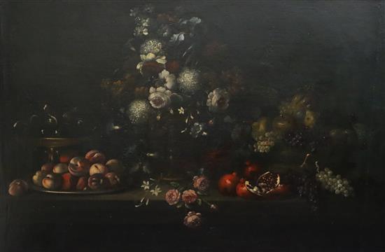 17th century Flemish School Still life of flowers and fruit on a table top 42 x 63in.